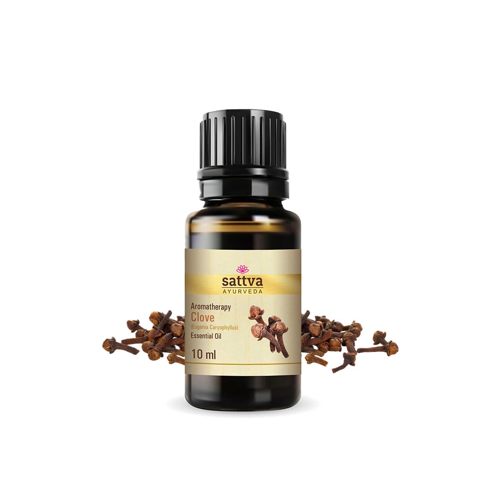 Frasco de óleo essencial de cravo-da-índia com aroma quente e especiado para práticas de aromaterapia ayurvédica.